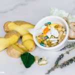 Healthy anti-inflammatory foods including berries, leafy greens, salmon, and turmeric