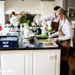 Anne Burrell smiling in the kitchen