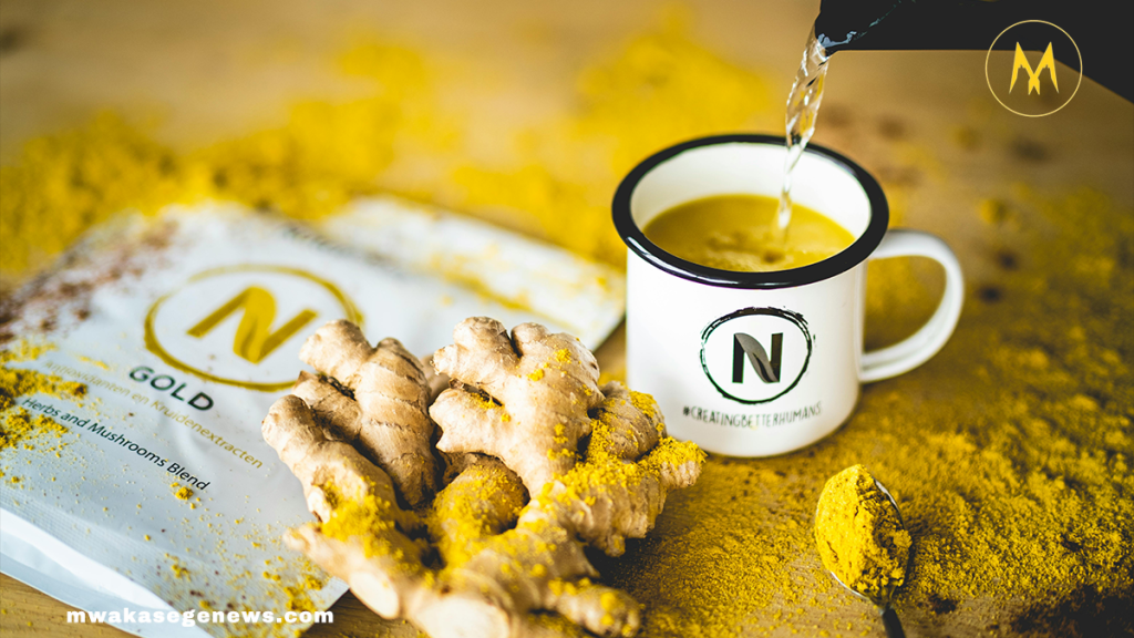 Bright and colorful anti-inflammatory detox drinks in glass jars with fresh ingredients.