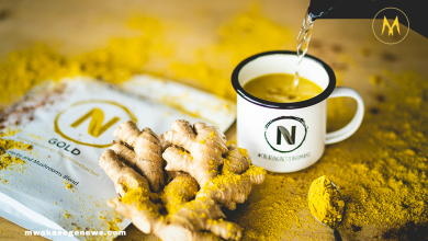 Bright and colorful anti-inflammatory detox drinks in glass jars with fresh ingredients.