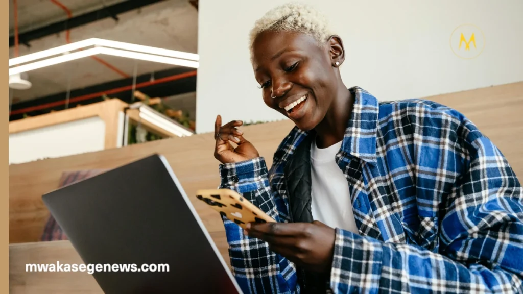 A young entrepreneur running a small business in Tanzania without a loan