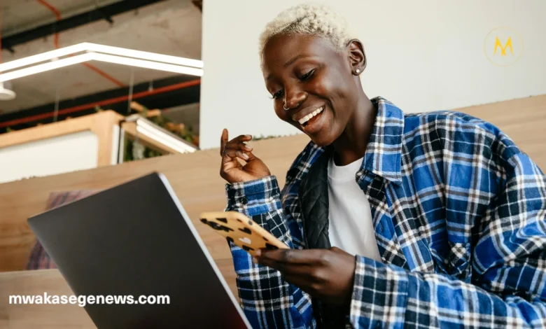 A young entrepreneur running a small business in Tanzania without a loan
