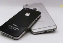 iPhone showing iOS 26 Beta home screen