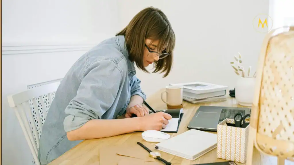 American blogger working from home on laptop to build a passive income blog