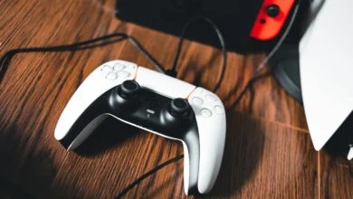 PS5 and PS5 Pro side-by-side comparison showing console design and controller