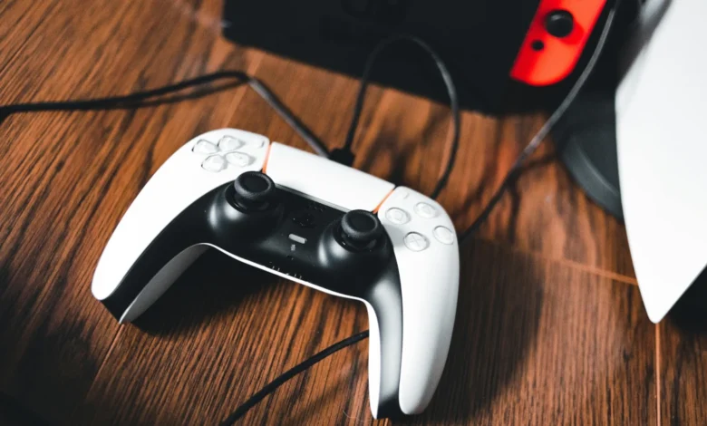 PS5 and PS5 Pro side-by-side comparison showing console design and controller