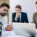 Entrepreneur analyzing business growth and planning success strategy