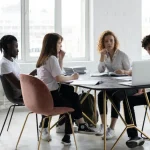 Small business owner analyzing digital marketing performance in 2025