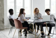 Small business owner analyzing digital marketing performance in 2025