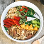 Healthy balanced meal with fruits, vegetables, and whole grains