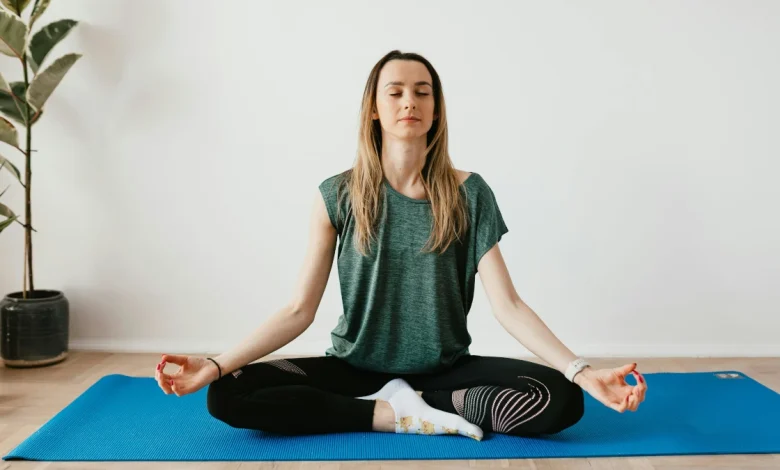 woman practicing mindfulness and mental wellness in a digital age